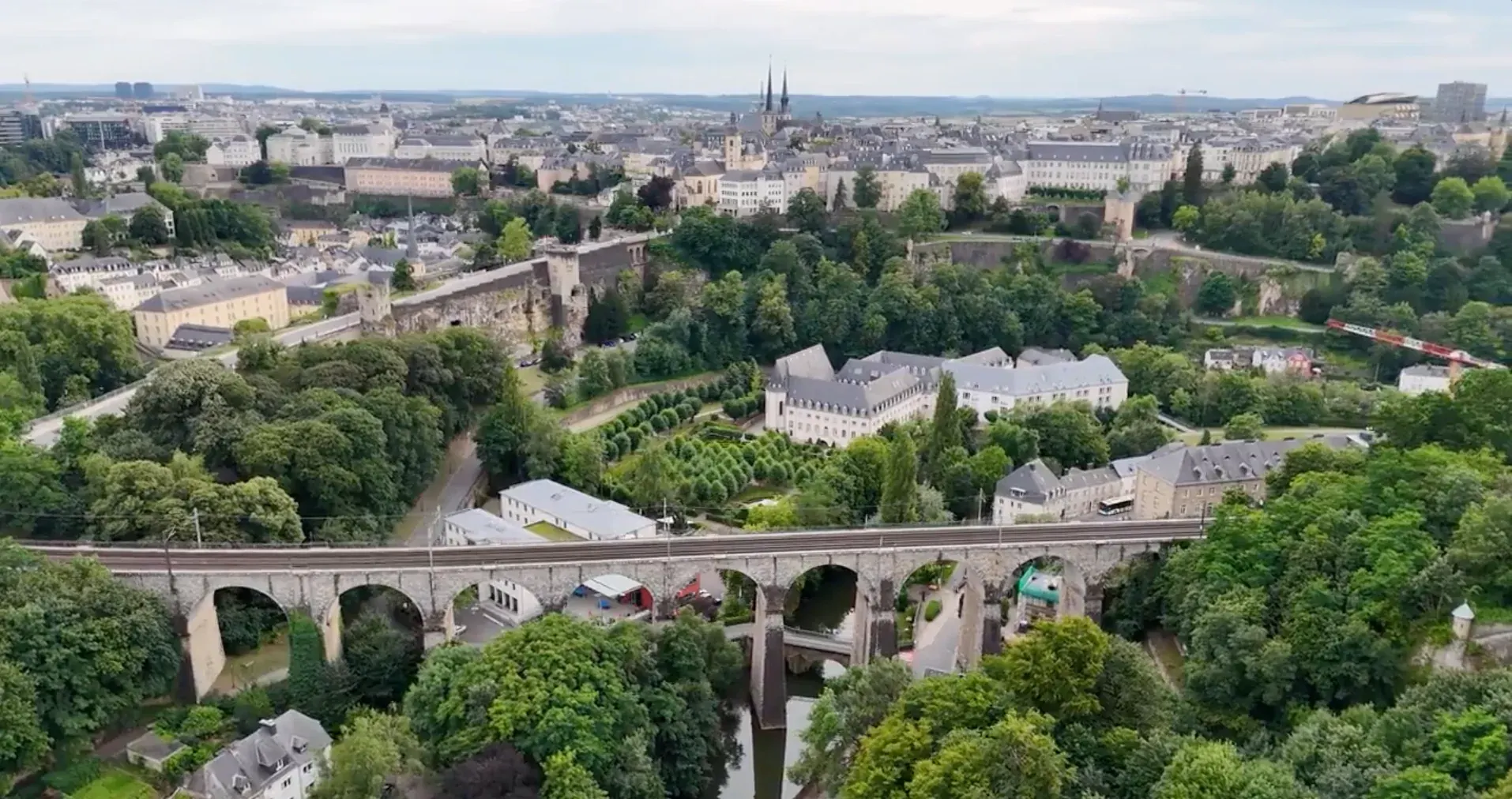 Aerial view across Luxembourg City and its historic fortifications.